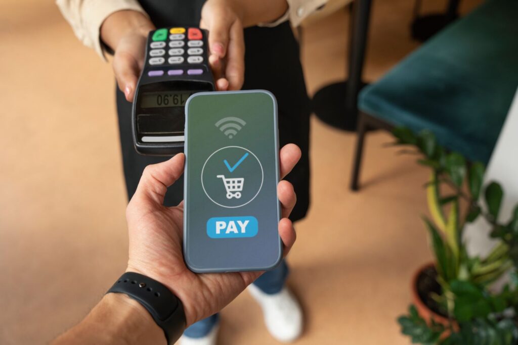 person paying using nfc technology (1)